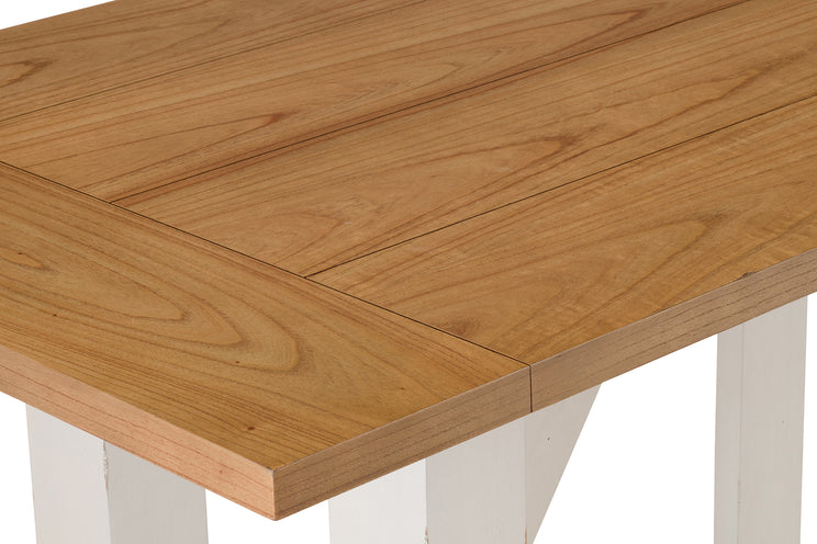 Wooden table with white legs on a plain background